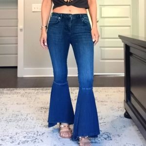 Free People high low flare jeans.